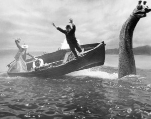 A $25,000 mechanical Loch Ness monster sends actors tumbling in the water in this scene for United Artists' thriller "The Private Life of Sherlock Holmes" which was being filmed in Scotland, Oct. 1969. Dr. Watson (Colin Blakely) leaps out of boat at right, while Gabrielle (Genevieve Page) and Sherlock Holmes (Robert Stephens) are struggling to keep their balance. The mechanical monster has disappeared into the 754-foot-deep loch and a San Francisco Insurance company says it is prepared to pay off. A fireman's fund spokesman says the monster itself isn't covered by insurance, but production delay costs because of the disappearance are insured. (AP Photo)