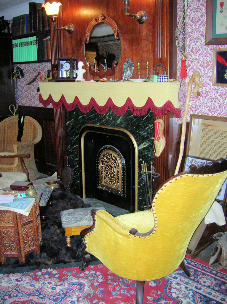 Holmes chair, next to the fireplace, complete with Persian slipper ~ 221B in Reading